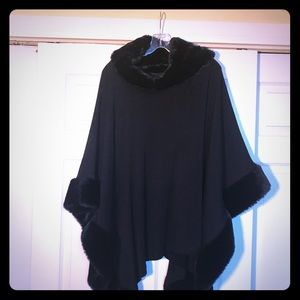 Statement piece-Black fur trimmed cape from Saks